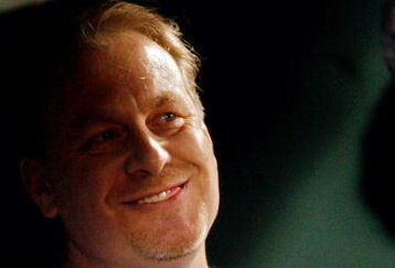 BOSTON - OCTOBER 16:  Curt Schilling of the Boston Red Sox looks on before game five of the American League Championship Series against the Tampa Bay Rays during the 2008 MLB playoffs at Fenway Park on October 16, 2008 in Boston, Massachusetts.  (Photo by Jim Rogash/Getty Images)