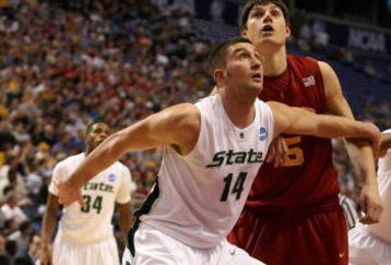 MINNEAPOLIS - MARCH 22:  Goran Suton #14 of the Michigan State Spartans fights for position under the basket against Nikola Vucevic #5 of the USC Trojans during the second round of the NCAA Division I Men's Basketball Tournament at the Hubert H. Humphrey Metrodome on March 22, 2009 in Minneapolis, Minnesota. Michigan State won 74-69. (Photo by Jonathan Daniel/Getty Images)