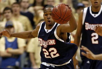 PITTSBURGH - DECEMBER 06:  Gary Tucker #22 of the Duquesne Dukes tries to gain control of the ball during a game against the Pittsburgh Panthers on December 6, 2006 at the Petersen Events Center in Pittsburgh, Pennsylvania. Pittsburgh defeated Duquesne, 73-56.  (Photo by Gregory Shamus/Getty Images)
