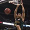 OKLAHOMA CITY - MARCH 08: Curtis Jerrelis #0 of the Baylor Bears dunks as Darryl Butterfield #35 lof the Missouri Tigers looks on during the first round of the Phillips 66 Big 12 Men's Basketball Championship on March 8, 2007 at the Ford Center in Oklahoma City, Oklahoma. (Photo by Jamie Squire/Getty Images)