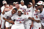 NEW YORK - MARCH 14:  The Louisville Cardinals celebrates after winning the championship game of the Big East Tournament against the Syracuse Orange at Madison Square Garden on March 14, 2009 in New York City.  (Photo by Jim McIsaac/Getty Images)