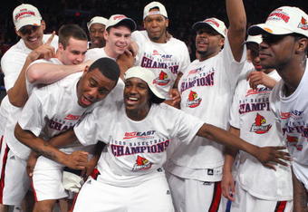 NEW YORK - MARCH 14:  The Louisville Cardinals celebrates after winning the championship game of the Big East Tournament against the Syracuse Orange at Madison Square Garden on March 14, 2009 in New York City.  (Photo by Jim McIsaac/Getty Images)