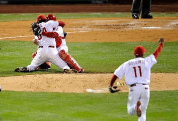 PHILADELPHIA - OCTOBER 29:  Catcher Carlos Ruiz #51 and Brad Lidge #54 of the Philadelphia Phillies celebrate after recording the final out of their 4-3 win to win the World Series against the Tampa Bay Rays during the continuation of game five of the 2008 MLB World Series on October 29, 2008 at Citizens Bank Park in Philadelphia, Pennsylvania.  (Photo by Jeff Zelevansky/Getty Images)