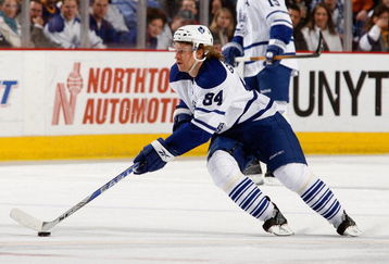 BUFFALO, NY - DECEMBER 12:  Mikhail Grabovski #84 of the Toronto Maple Leafs skates with the puck during the game against the Buffalo Sabres on December 12, 2008 at HSBC Arena in Buffalo, New York. (Photo by Rick Stewart/Getty Images)
