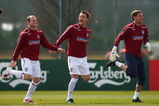 ST ALBANS, ENGLAND - MARCH 24:  Wayne Rooney, John Terry and Ben Foster of England share a joke during England training at London Colney on March 24, 2009 in St Albans, England.  (Photo by Jamie McDonald/Getty Images)
