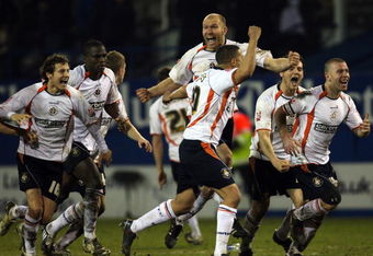 LUTON, UNITED KINGDOM - FEBRUARY 17:  Luton Town celebrate winning leg two of the Johnstone's Paint Trophy Southern Area Final between Luton Town and Brighton & Hove Albion at Kenilworth Road on February 17, 2009 in Luton, England.  (Photo by Bryn Lennon/Getty Images)
