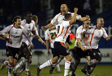 LUTON, UNITED KINGDOM - FEBRUARY 17:  Luton Town celebrate winning leg two of the Johnstone's Paint Trophy Southern Area Final between Luton Town and Brighton & Hove Albion at Kenilworth Road on February 17, 2009 in Luton, England.  (Photo by Bryn Lennon/Getty Images)