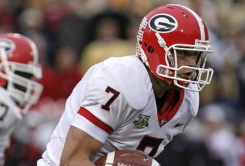 ATLANTA - NOVEMBER 24: Quarterback Matthew Stafford #7 of the Georgia Bulldogs rushes for a second quarter touchdown during the game against the Georgia Tech Yellow Jackets on November 24, 2007 at Bobby Dodd Stadium at Historic Grant Field in Atlanta, Georgia.  Georgia defeated Georgia Tech 31-17.  (Photo by Mike Zarrilli/Getty Images)