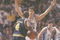 6 Apr 1992:  Forward Chris Webber of the Michigan Wolverines tries to fend off center Christian Laettner of the Duke Blue Devils during a playoff game at the Hubert H. Humphrey Metrodome in Minneapolis, Minnesota.  Duke won the game 71-51. Mandatory Credit: Jonathan Daniel  /Allsport