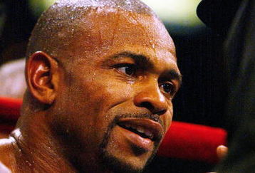 TAMPA, FL - OCTOBER 1:  Roy Jones Jr. listens to his father Roy Jones Sr. in his corner between rounds against Antonio Tarver in the IBO Light Heavyweight Championship bout at the St. Pete Times Forum on October 1, 2005 in Tampa, Florida. Tarver defeated Jones in a unanimous decision.  (Photo by Doug Benc/Getty Images)