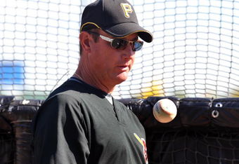 BRADENTON, FL - MARCH 8:  Manager John Russell #7 of the Pittsburgh Pirates tosses a ball before play against the Houston Astros March 8, 2009 at McKechnie Field in Bradenton, Florida.  (Photo by Al Messerschmidt/Getty Images)