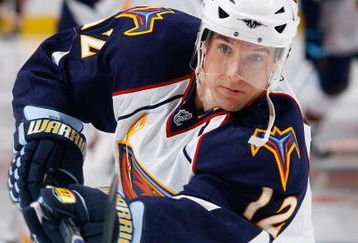 OTTAWA - DECEMBER 3:  Todd White #12 of the Atlanta Thrashers shoots the puck in warm-ups against the Ottawa Senators during the NHL game on December 3, 2008 at the Scotiabank Place in Ottawa, Canada.  The Senators defeated the Thrashers 5-1. (Photo by Phillip MacCallum/Getty Images)