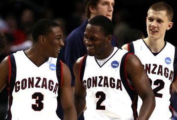 PORTLAND, OR - MARCH 21:  Demetri Goodson #3 of the Gonzaga Bulldogs and teammates Jeremy Pargo #2 and Micah Downs #22 celebrate after Goodson made the game-winning basket to defeat the Western Kentucky Hilltoppers during the second round of the NCAA Division I Men's Basketball Tournament at the Rose Garden on March 21, 2009 in Portland, Oregon. The Bulldgos defeated the Hilltoppers 83-81 to advance to the Sweet 16.  (Photo by Jonathan Ferrey/Getty Images)