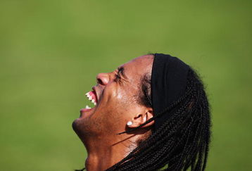 DUBAI, UNITED ARAB EMIRATES - JANUARY 05:  Ronaldinho of AC Milan laughs during a training session during the AC Milan Winter Training Camp at the Al Nasr Sports Club on January 5, 2009 in Dubai, United Arab Emirates.  (Photo by Ryan Pierse/Getty Images)