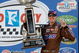 BRISTOL, TN - MARCH 22: Kyle Busch, driver of the #18 Snickers Toyota, poses in victory lane after winning the NASCAR Sprint Cup Series Food City 500 at Bristol Motor Speedway on March 22, 2009 in Bristol, Tennessee. (Photo by Geoff Burke/Getty Images for NASCAR)