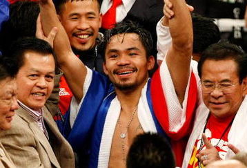 LAS VEGAS - DECEMBER 06:  Manny Pacquiao of the Philippines celebrates after defeating Oscar De La Hoya in their welterweight fight at the MGM Grand Garden Arena December 6, 2008 in Las Vegas, Nevada.  (Photo by Ethan Miller/Getty Images)