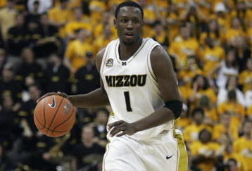 COLUMBIA, MO - JANUARY 16: Jimmy McKinney #1 of the Missouri Tigers drives the ball upcourt against the Kansas Jayhawks on January 16,2006 at Mizzou Arena in Columbia, Missouri. Missouri defeated Kansas 89-86 in overtime. (Photo by Elsa/Getty Images)