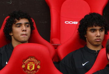 MANCHESTER, UNITED KINGDOM - AUGUST 06:  Rafael Da Silva (L) sits on the bench beside his twin brother and team mate Fabio Da Silva of Manchester United prior to the Pre Season Friendly match between Manchester United and Juventus at Old Trafford on August 6, 2008 in Manchester, England. (Photo by Phil Cole/Getty Images)