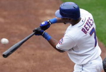 NEW YORK - SEPTEMBER 27:  Jose Reyes #7 of the New York Mets connects for a first inning base hit against the Florida Marlins on September 27, 2008 at Shea Stadium in the Flushing neighborhood of the Queens borough of New York City.  (Photo by Jim McIsaac/Getty Images)