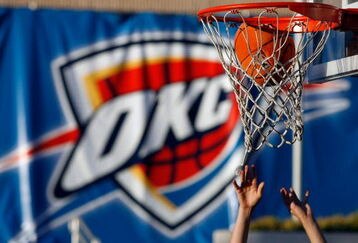OKLAHOMA CITY - OCTOBER 29:  A fan plays basketball outside before the Milwaukee Bucks play the Oklahoma City Thunder at the Ford Center on October 29, 2008 in Oklahoma City, Oklahoma. NOTE TO USER: User expressly acknowledges and agrees that, by downloading and/or using this Photograph, user is consenting to the terms and conditions of the Getty Images License Agreement.   (Photo by Chris Graythen/Getty Images)