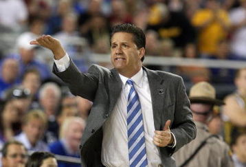 GLENDALE, AZ - MARCH 26:  Head Coach John Calipari of the Memphis Tigers adjusts his team against the Missouri Tigers in the Sweet 16 of the NCAA Division I Men's Basketball Tournament at the University of Phoenix Stadium on March 26, 2009 in Glendale, Arizona.  (Photo by Ronald Martinez/Getty Images)