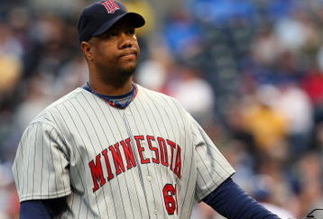 KANSAS CITY, MO - MAY 28:  Livan Hernandez #61 of the Minnesota Twins walks off the field after giving up a run in the first inning against the Kansas City Royals at Kauffman Stadium May 22, 2008 in Kansas City, Missouri. (Photo by G. Newman Lowrance/Getty Images)