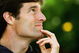 MELBOURNE, AUSTRALIA - MARCH 30: Mark Webber of Australia and the William-Cosworth team listens to questions as he sits in the paddock prior to the Australian Formula One Grand Prix at the Albert Park Circuit on March 30, 2006 in Melbourne, Australia. (Photo by Clive Rose/Getty Images)