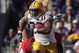 BATON ROUGE, LA - OCTOBER 25: LSU Tigers running back Charles Scott #25 runs for a first down against the Georgia Bulldogs during their football game at Tiger Stadium on October 25, 2008 in Baton Rouge, Louisiana. (Photo by Dave Martin/Getty Images)