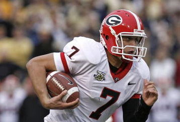 ATLANTA - NOVEMBER 24: Quarterback Matthew Stafford #7 of the Georgia Bulldogs rushes for a second quarter touchdown during the game against the Georgia Tech Yellow Jackets on November 24, 2007 at Bobby Dodd Stadium at Historic Grant Field in Atlanta, Georgia.  Georgia defeated Georgia Tech 31-17.  (Photo by Mike Zarrilli/Getty Images)