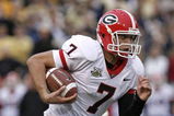 ATLANTA - NOVEMBER 24: Quarterback Matthew Stafford #7 of the Georgia Bulldogs rushes for a second quarter touchdown during the game against the Georgia Tech Yellow Jackets on November 24, 2007 at Bobby Dodd Stadium at Historic Grant Field in Atlanta, Georgia.  Georgia defeated Georgia Tech 31-17.  (Photo by Mike Zarrilli/Getty Images)