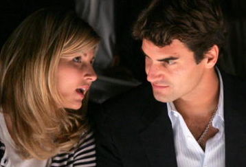 NEW YORK - SEPTEMBER 11:  Tennis player Roger Federer and his girlfriend Mirka Vavrinec sit in the front row at the Oscar de la Renta Spring 2007 fashion show during Olympus Fashion Week in the Tent in Bryant Park September 11, 2006 in New York City.  (Photo by Peter Kramer/Getty Images For IMG)