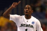 MINNEAPOLIS - MARCH 20:  Kalin Lucas #1 of the Michigan State Spartans calls a play as he brings the ball up court against the Robert Morris Colonials during the first round of the NCAA Division I Men's Basketball Tournament at the Hubert H. Humphrey Metrodome on March 20, 2009 in Minneapolis, Minnesota.  (Photo by Jonathan Daniel/Getty Images)