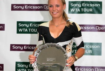 KEY BISCAYNE, FL - MARCH 26:  Caroline Wozniacki poses with her 2008 Sony Ericsson WTA Tour Newcomer of the Year Player Award during day four of the Sony Ericsson Open at the Crandon Park Tennis Center on March 26, 2009 in Key Biscayne, Florida.  (Photo by Matthew Stockman/Getty Images)