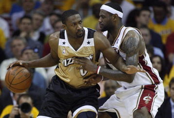 CLEVELAND - APRIL 21:  Gilbert Arenas #0 of the Washington Wizards tries to get around LeBron James #23 of the Cleveland Cavaliers in Game Two of the Eastern Conference Quarterfinals during the 2008 NBA Playoffs at Quicken Loans Arena April 21, 2008 in Cleveland, Ohio.  NOTE TO USER: User expressly acknowledges and agrees that, by downloading and or using this photograph, User is consenting to the terms and conditions of the Getty Images License Agreement.  (Photo by Gregory Shamus/Getty Images)