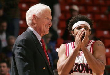 BOISE, ID - MARCH 19:  Head coach Lute Olson and Salim Stoudamire #20 of the Arizona Wildcats celebrate after defeating the University of Alabama at Birmingham Blazers in the 2005 NCAA division 1 men's basketball championship tournament game at Taco Bell Arena on March 19, 2005 in Boise, Idaho.  The Wildcats defeated the Blazers 85-63.    (Photo by Jonathan Ferrey/Getty Images)