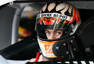 ATLANTA - MARCH 07:  Joey Lagano driver of the #20 Home Depot Toyota sits in his car during practice for the NASCAR Sprint Cup Series Kobalt Tools 500 at the Atlanta Motor Speedway on March 7, 2009 in Hampton, Georgia.  (Photo by John Harrelson/Getty Images)