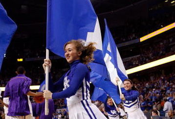 TAMPA, FL - MARCH 13:  Cheerleaders of the Kentucky Wildcats cheer before the game against the Louisiana State University Tigers during the second round of the SEC Men's Basketball Tournament on March 13, 2009 at The St. Pete Times Forum in Tampa, Florida.  (Photo by Chris Graythen/Getty Images)