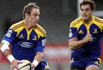 DUNEDIN, NEW ZEALAND - MARCH 21:  Jimmy Cowan and Israel Dagg of the Highlanders make a break during the round six Super 14 match between the Highlanders and the Cheetahs at Carisbrook on March 21, 2009 in Dunedin, New Zealand.  (Photo by Martin Hunter/Getty Images)
