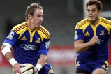 DUNEDIN, NEW ZEALAND - MARCH 21:  Jimmy Cowan and Israel Dagg of the Highlanders make a break during the round six Super 14 match between the Highlanders and the Cheetahs at Carisbrook on March 21, 2009 in Dunedin, New Zealand.  (Photo by Martin Hunter/Getty Images)