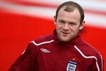 LONDON COLNEY, ENGLAND - MARCH 27:  England's Wayne Rooney walks to the training venue during England training at London Colney on March 27, 2009 in London Colney, England.  (Photo by Jamie McDonald/Getty Images)