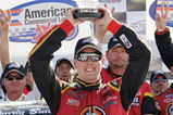 HAMPTON, GA - MARCH 07:  Kyle Busch driver of the #51 Miccosukee Resort Toyota celebrates in Victory Lane with his team after the NASCAR Craftsman Truck Series American Commercial Lines 200 at the Atlanta Motor Speedway on March 7, 2009 in Hampton, Georgia.  (Photo by John Harrelson/Getty Images)