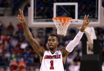 INDIANAPOLIS - MARCH 27:  Terrence Williams #1 of the Louisville Cardinals celebrates on court against the Arizona Wildcats during the third round of the NCAA Division I Men's Basketball Tournament at the Lucas Oil Stadium on March 27, 2009 in Indianapolis, Indiana.  (Photo by Andy Lyons/Getty Images)