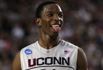 GLENDALE, AZ - MARCH 26:  Center Hasheem Thabeet #34 of the Connenticut Huskies celebrates after defeating the Purdue Boilermakers 72-60 in the Sweet 16 of the NCAA Division I Men's Basketball Tournament at the University of Phoenix Stadium on March 26, 2009 in Glendale, Arizona.  (Photo by Ronald Martinez/Getty Images)