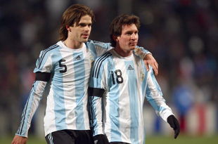 MARSEILLE, FRANCE - FEBRUARY 11:  Lionel Messi (R) walks off with team mate Fernando Gago (L) after the 2-0 victory during the International Friendly match between France and Argentina at the Stade Velodrome on February 11, 2009 in Marseille, France.  (Photo by Michael Steele/Getty Images)