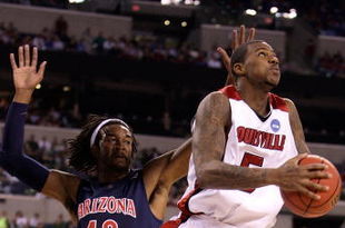 INDIANAPOLIS - MARCH 27:  Earl Clark #5 of the Louisville Cardinals drives for a shot attempt against Jordan Hill #43 of the Arizona Wildcats during the third round of the NCAA Division I Men's Basketball Tournament at the Lucas Oil Stadium on March 27, 2009 in Indianapolis, Indiana.  (Photo by Andy Lyons/Getty Images)