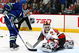 VANCOUVER, CANADA - DECEMBER 27:  Brendan Morrison #7 of the Vancouver Canucks scores a shorthanded goal on Miikka Kiprusoff #34 of the Calgary Flames during their game at General Motors Place on December 27, 2006 in Vancouver, Canada. Vancouver defeated Calgary 6-5.   (Photo by Jeff Vinnick/Getty Images)