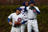 CHICAGO - MAY 10: (L-R) Reed Johnson #9, Alfonso Soriano #12 and Kosuke Fukudome #1 of the Chicago Cubs celebrate a win over the Arizona Diamondbacks on May 10, 2008 at Wrigley Field in Chicago, Illinois. The Cubs defeated the Diamondbacks 7-2. (Photo by Jonathan Daniel/Getty Images)