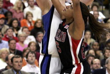 BOSTON - APRIL 04:  Alison Bales #43 of Duke loses the ball to Marissa Coleman #25 of Maryland during the 2006 NCAA Women's Basketball Championship Game on April 4, 2006 at the TD Banknorth Garden in Boston, Massachusetts. The Maryland Terrapins defeated the Duke Blue Devils 78-75.  (Photo by Elsa/Getty Images)