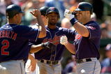BALTIMORE - MAY 7:  Travis Hafner #48 of the Cleveland Indians is congratulated by Jhonny Peralta #2 and Josh Barfield #29 after hitting a grand slam in the eighth inning against the Baltimore Orioles on May 7, 2007 at Oriole Park at Camden Yards in Baltimore, Maryland.  (Photo by Greg Fiume/Getty Images)