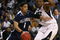 BOSTON - MARCH 28:  Scottie Reynolds #1 of the Villanova Wildcats drives past Tyrell Biggs #5 of the Pittsburgh Panthers during the NCAA Men's Basketball Tournament East Regionals at TD Banknorth Garden on March 28, 2009 in Boston, Massachusetts.  (Photo by Elsa/Getty Images)